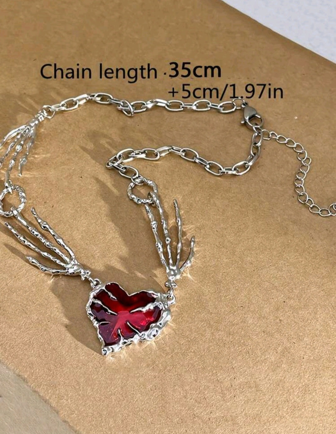 Skeleton Chain with Burgundy Heart Pendant
Necklace